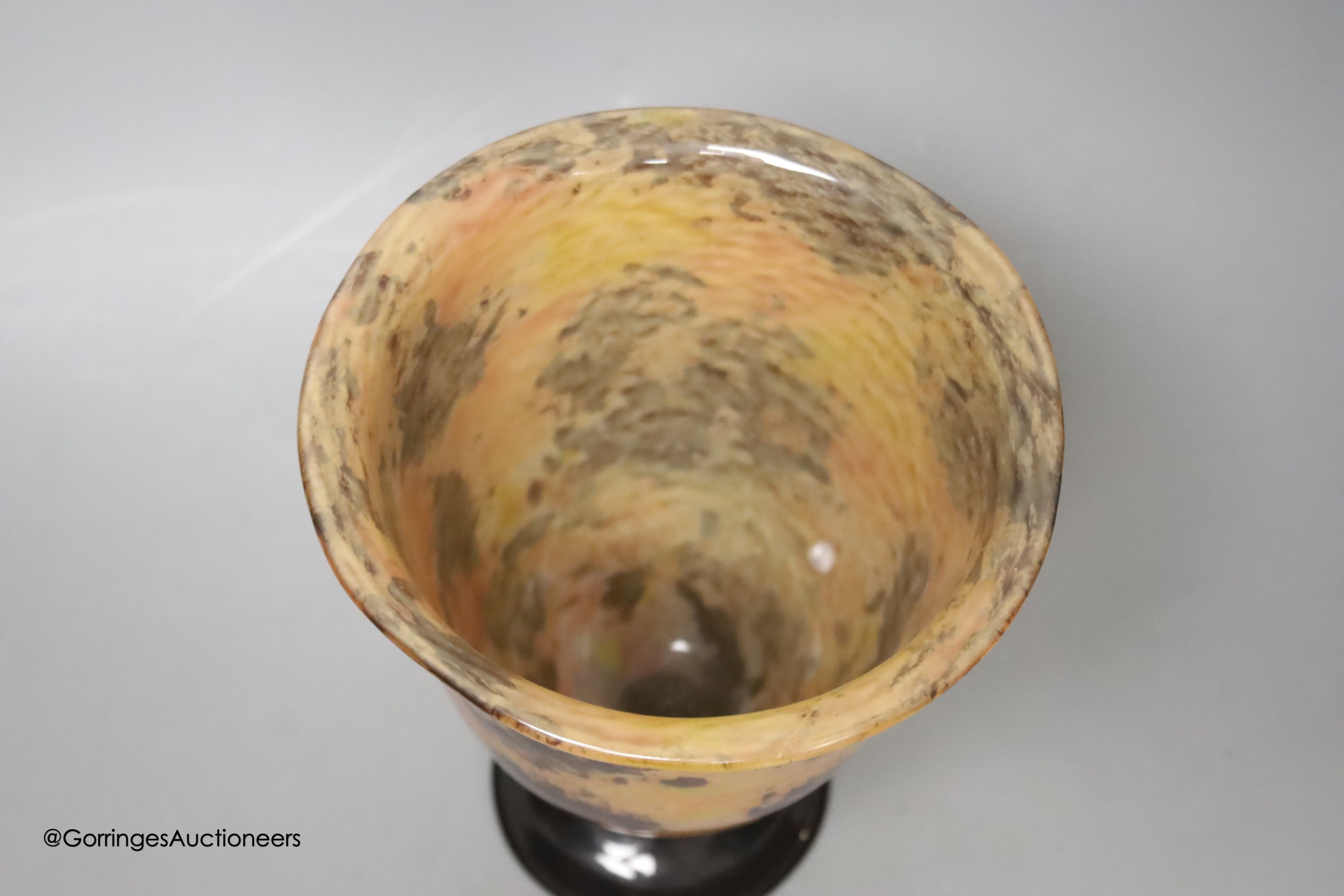 A Schneider multi-coloured pedestal glass vase, signed to base, height 19cm